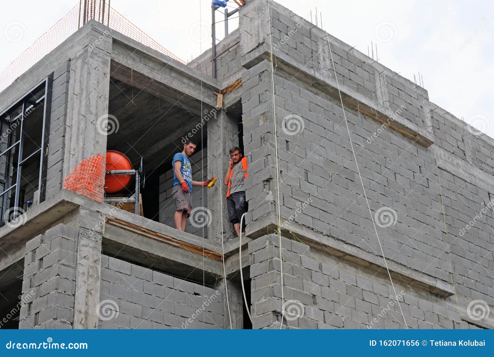 The Process Of Building Wall Insulation Using Polystyrene Stock Image the-process-of-building-wall-insulation-using-polystyrene-stock-image