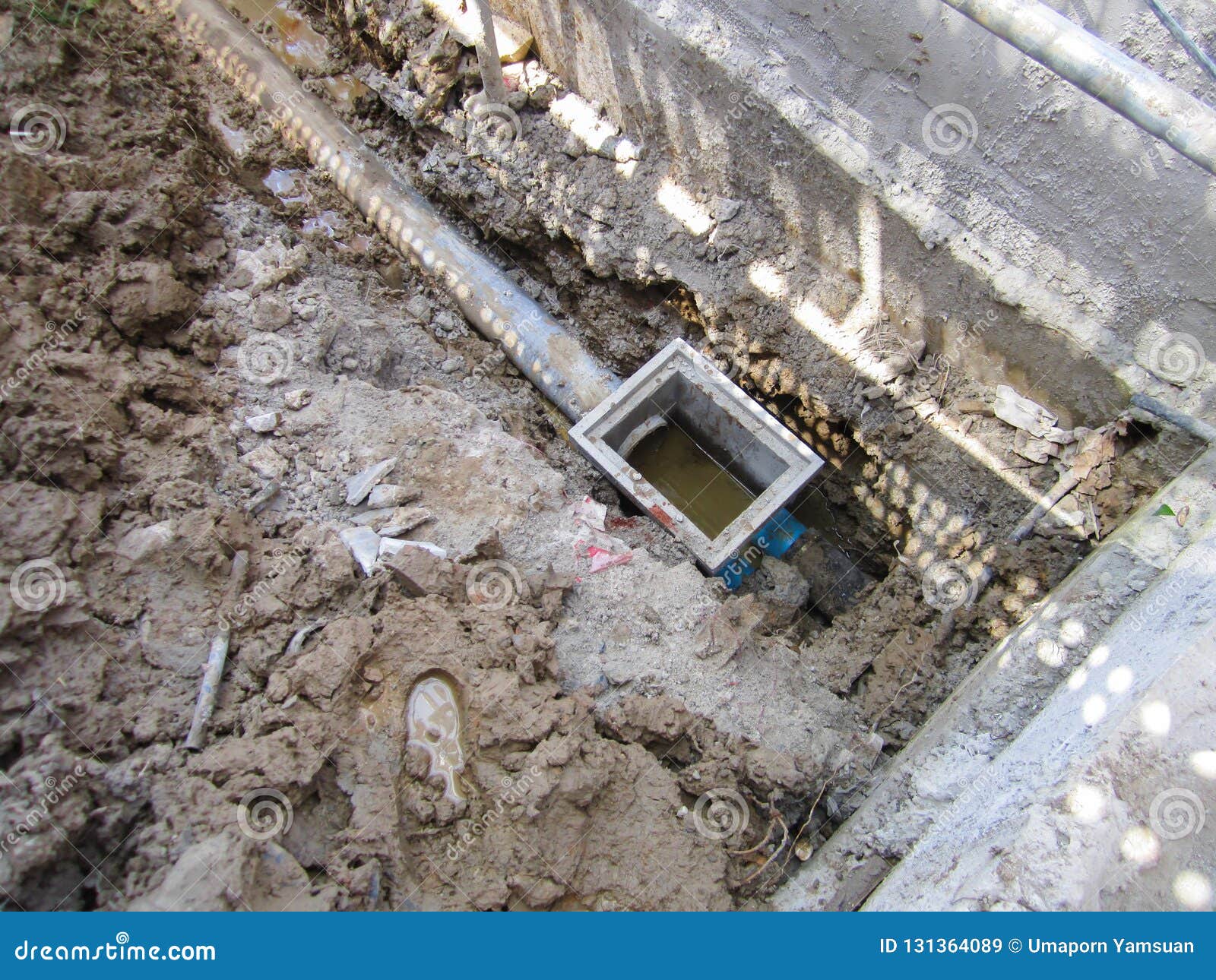 The Process Burying Drainage Pipe Around the Building. Stock Image