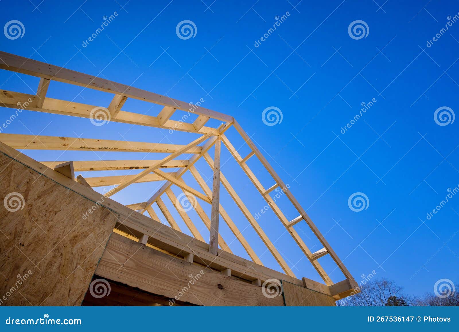 The Process of Constructing the Wooden Roof Beam for a Newly Built