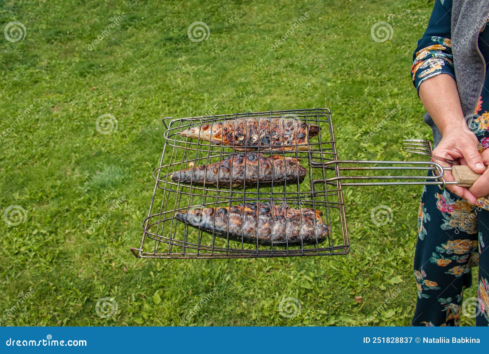 The Process of Cooking Mackerel Fish in a Marinade on the Grill. Fried