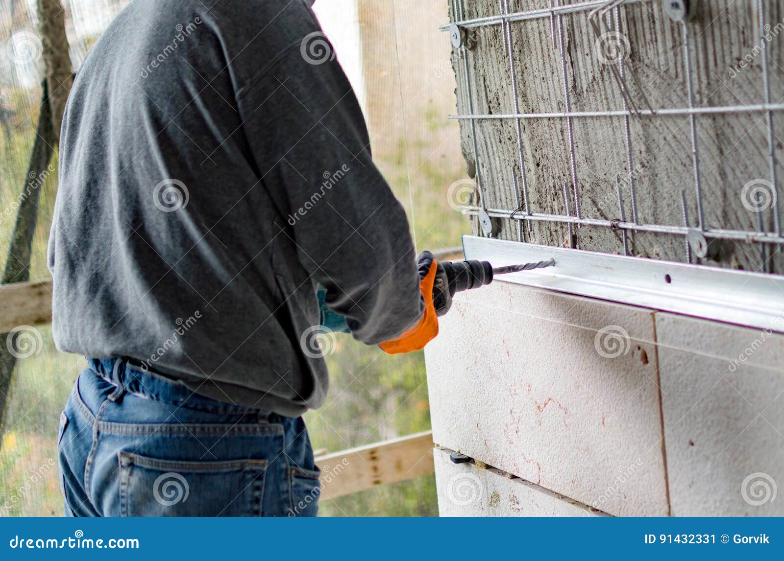 The Process of Drilling Holes in the Concrete Stock Image Image of