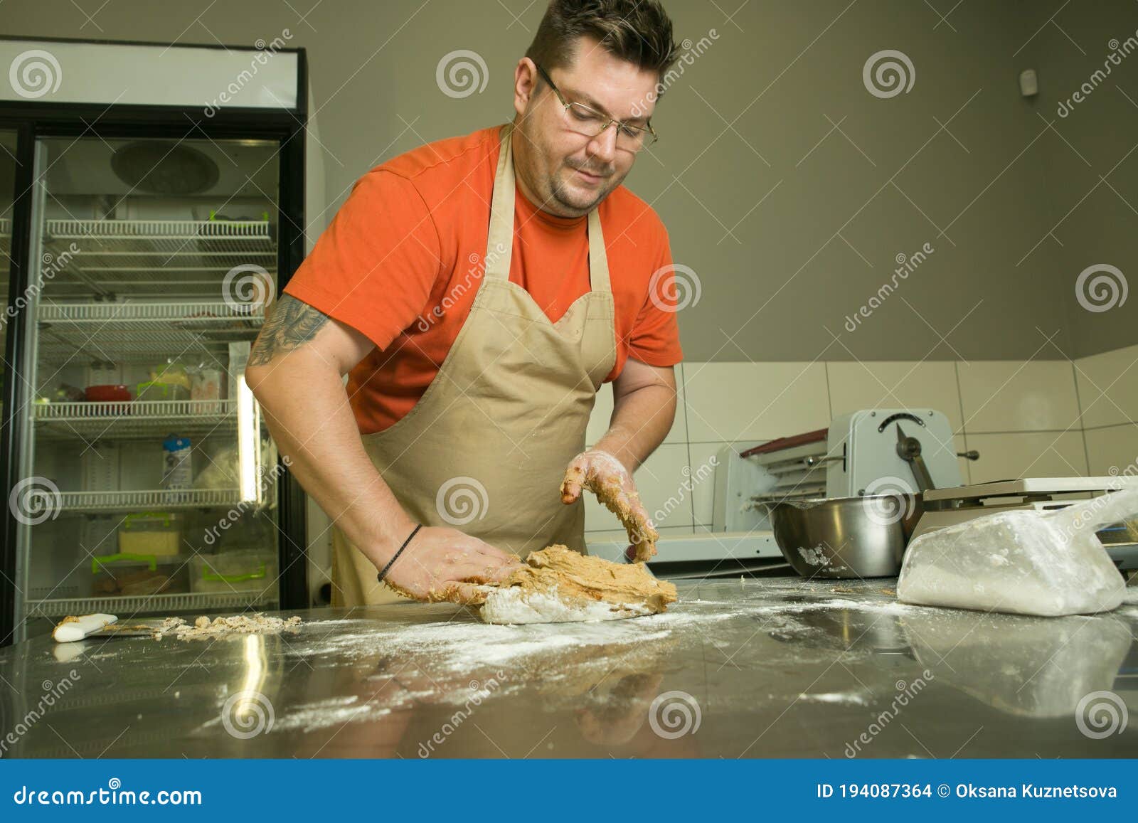 The Process of Making Bread. the Chef Kneads the Dough by Hand Stock