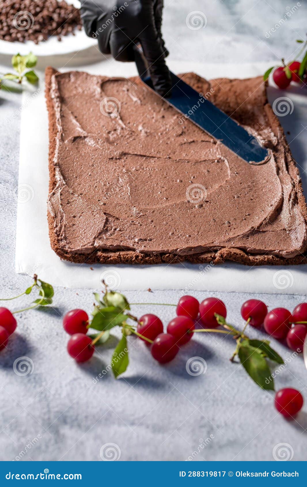 The Process of Making Cooking Roll in Kitchen with Cherries and Grated