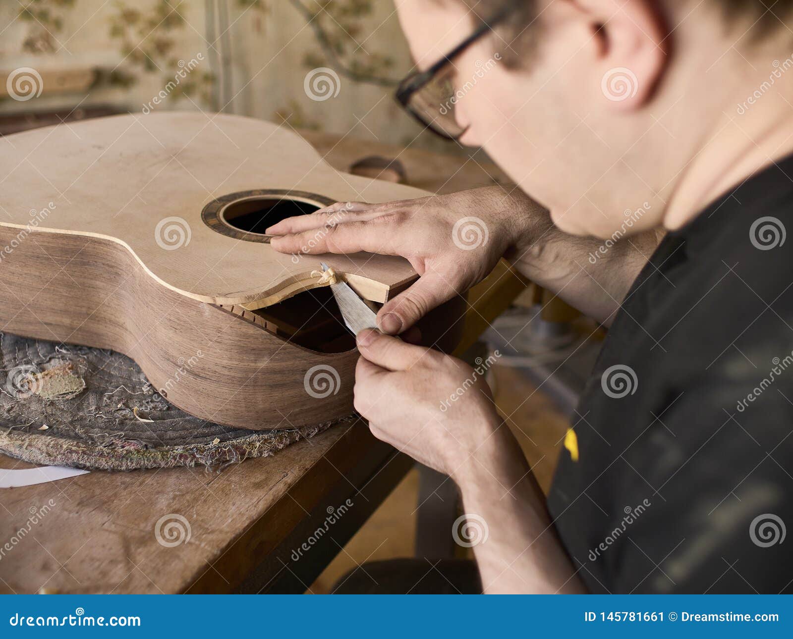 The Process of Making a Cutaway on Classical Guitar. Stock Image