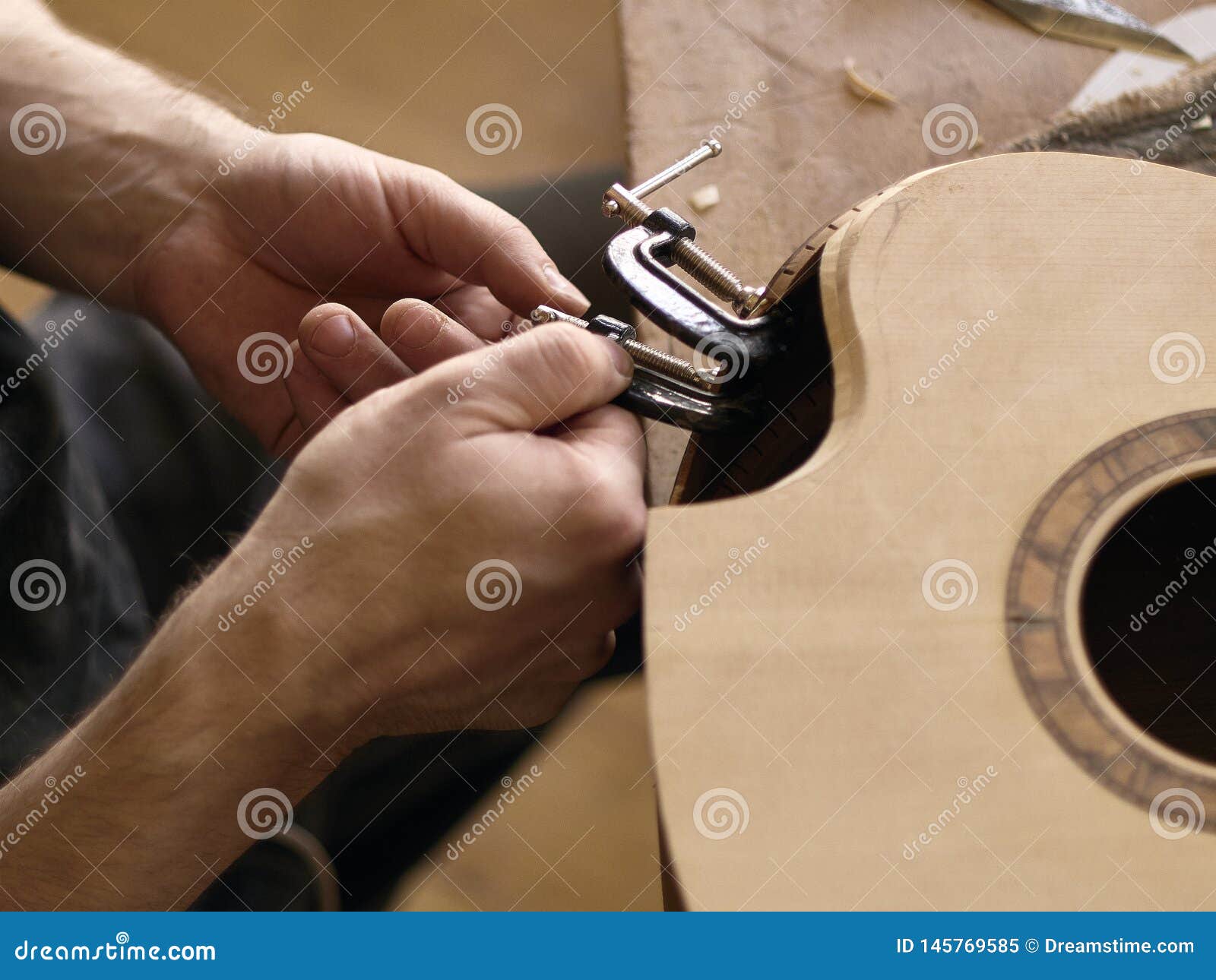 The Process of Making a Cutaway on Classical Guitar. Stock Image
