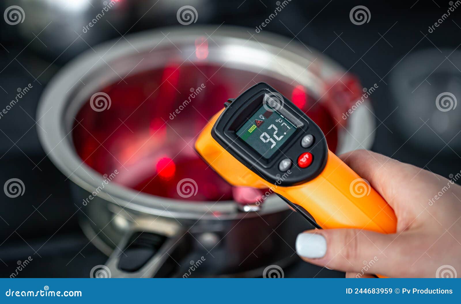 The Process of Making Fruit Jelly on an Induction Cooker. Stock Image