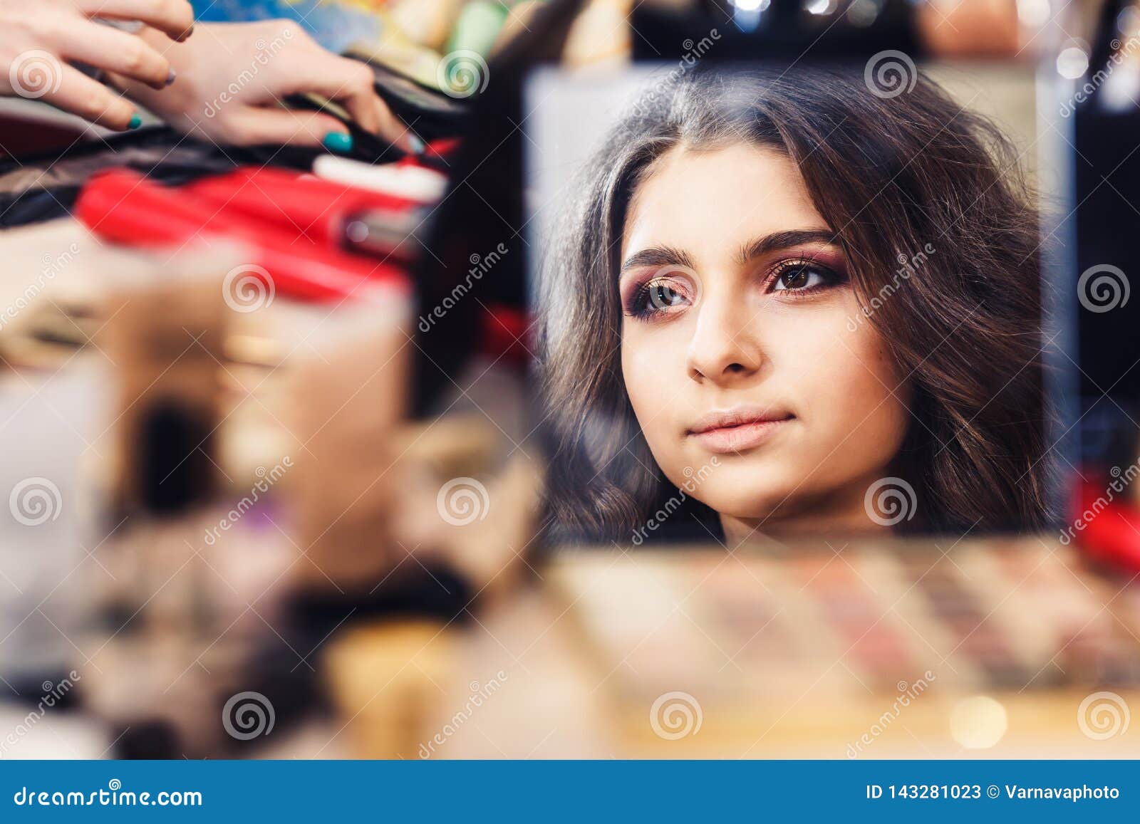Process of Making Makeup. Face of Model is Reflected in Mirror during