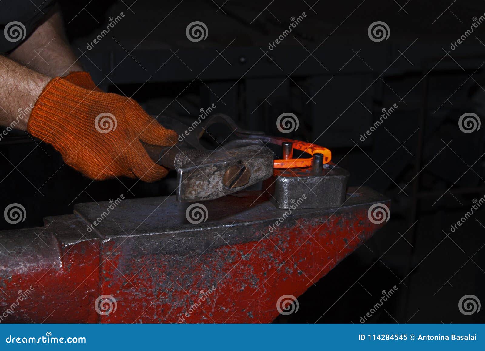 The Process of Manufacturing of Horseshoes for Horses in Stock