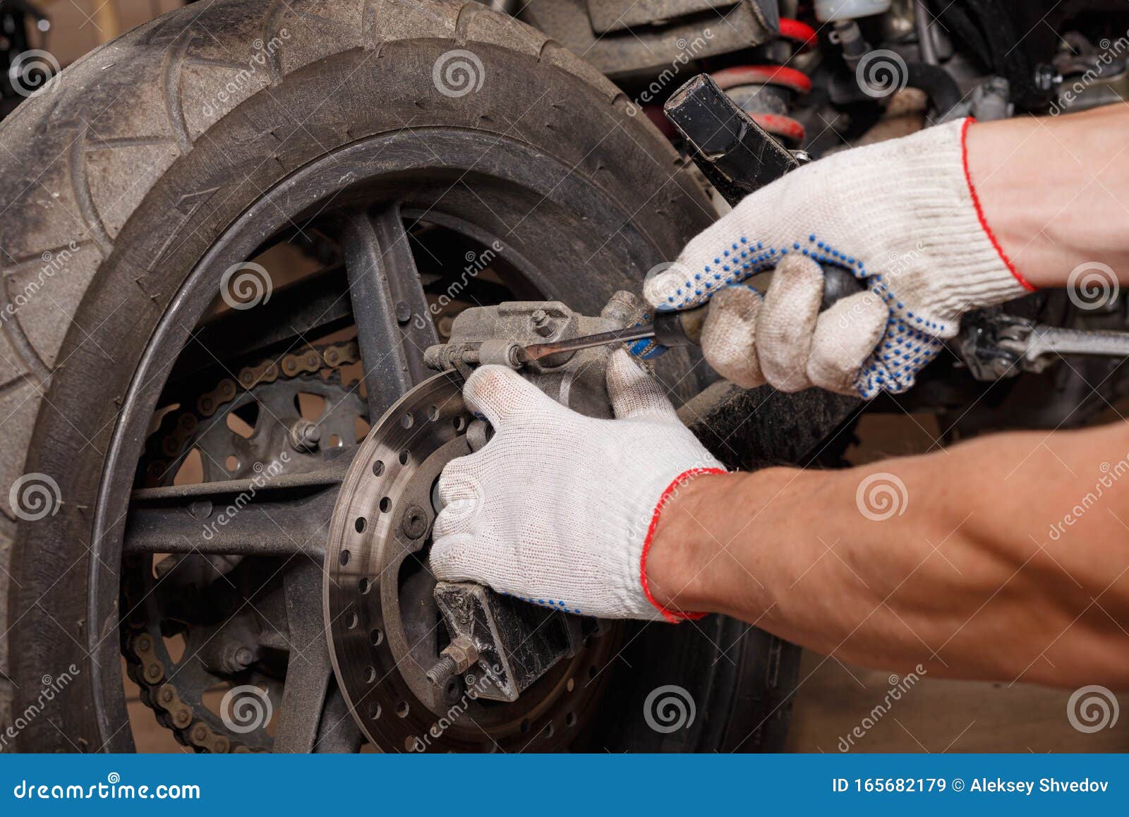 The Process of Replacing Brake Pads on a Motorcycle Stock Image Image