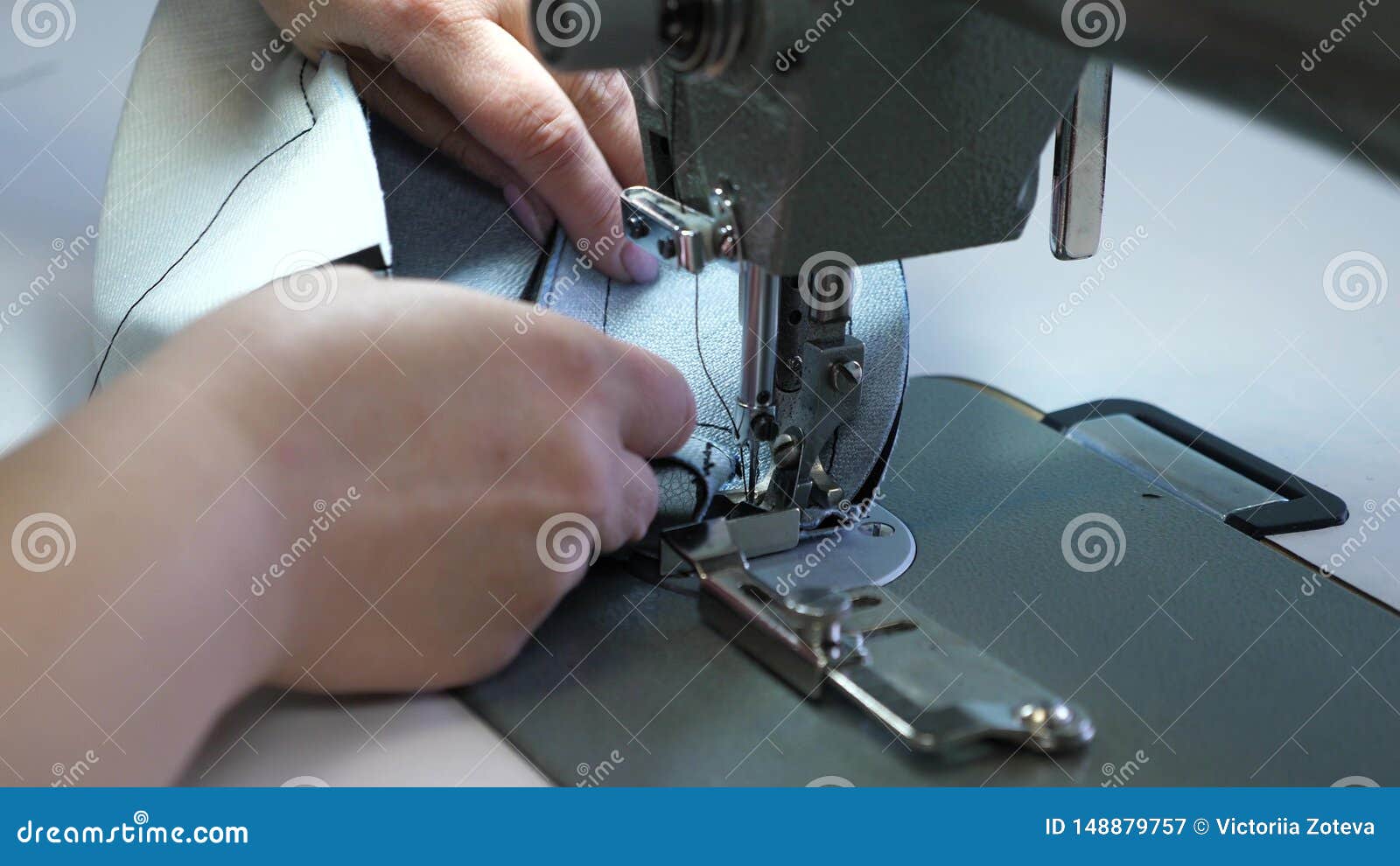 Process Of Sewing Leather Goods. The Needle Of The Sewing Machine In A Sewing Machine Needle Moves Up And Down