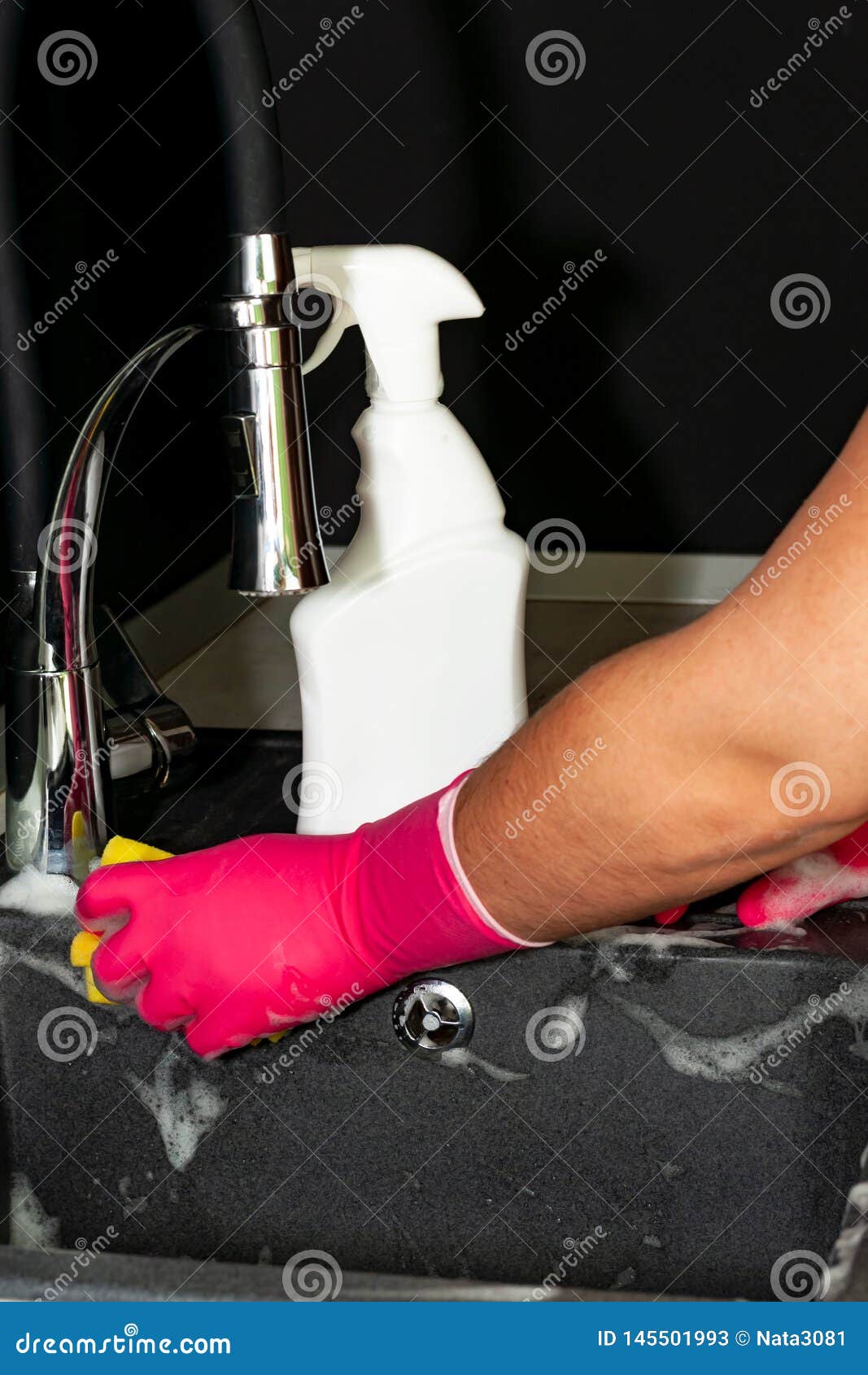 The Process of Washing the Sink, Hands Closeup. Putting Detergent on