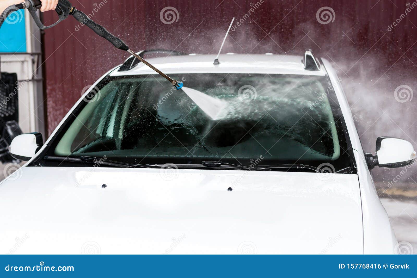 The Process of Washing the Windshield of a Car Using a Pressure Washer Stock Photo Image of