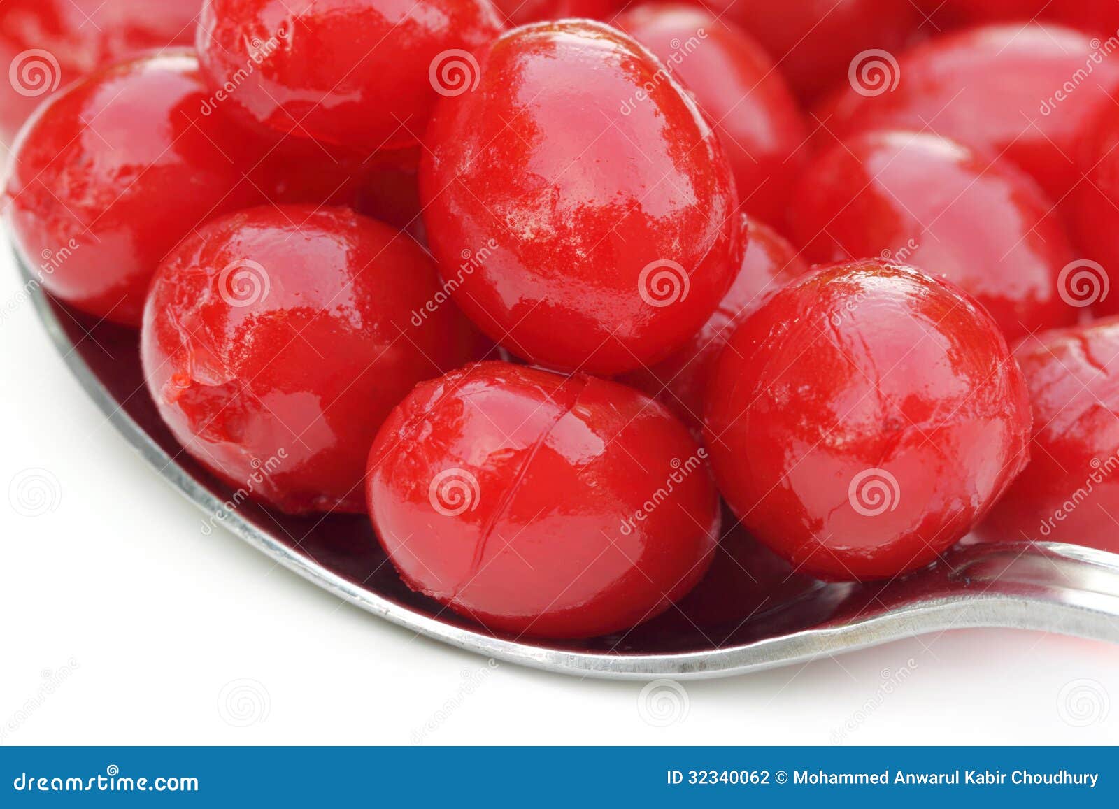 Processed Cherry On A Silver Spoon Stock Photo - Image of ...