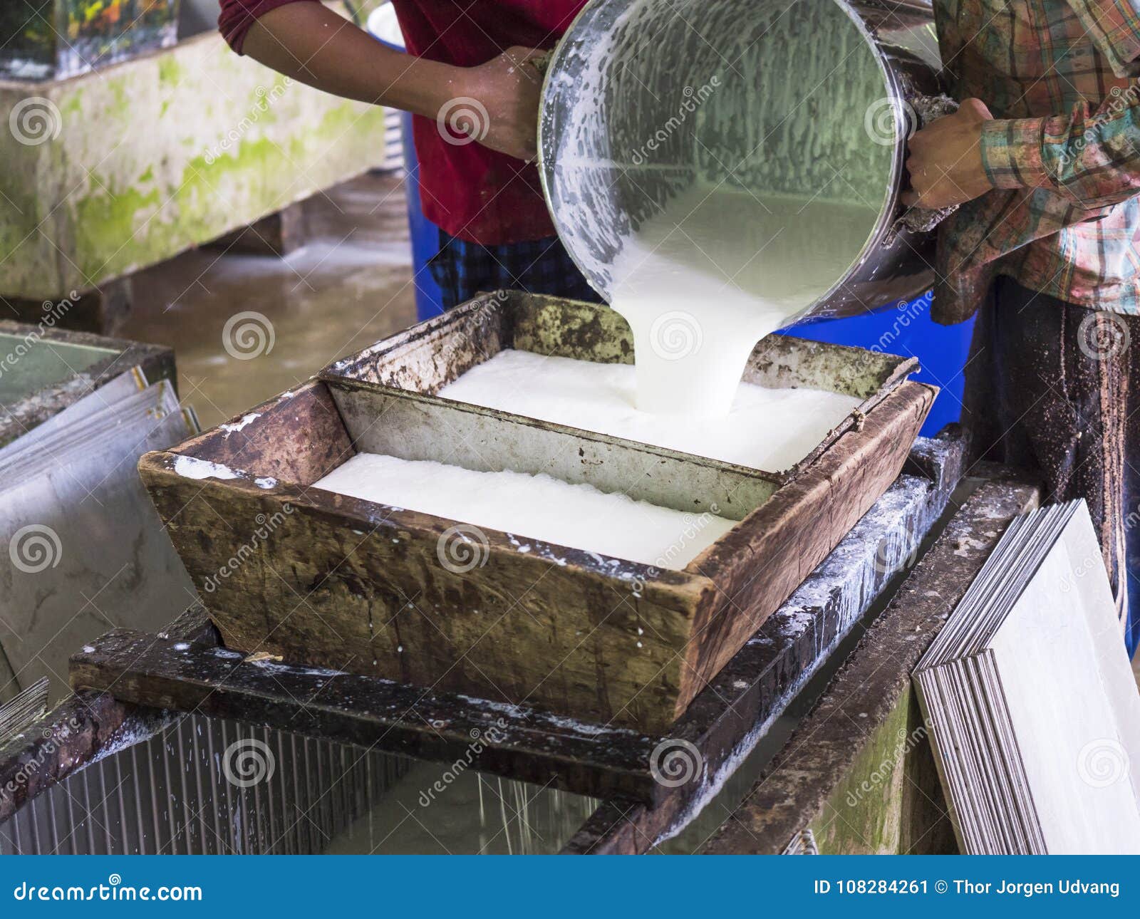 Processing of raw rubber stock image. Image of liquid 108284261