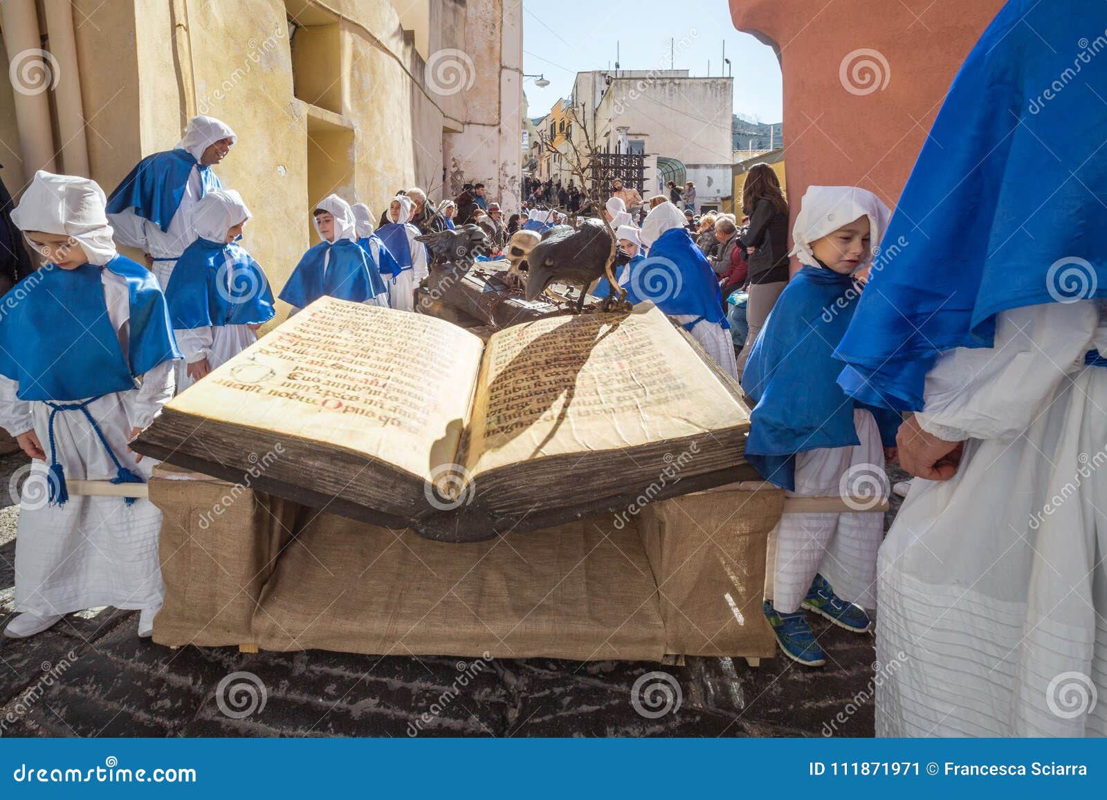 PROCIDA EASTER Good Friday procession. PROCIDA, ITALY - MARCH 25, 2016 - Every year the procession of the `Misteri` is celebrated at Easter`s Good Friday in Procida, Italy. Islanders carry through the streets elaborate and heavy `Misteries` representing scenes from The Bible. Even the children are involved in the procession.