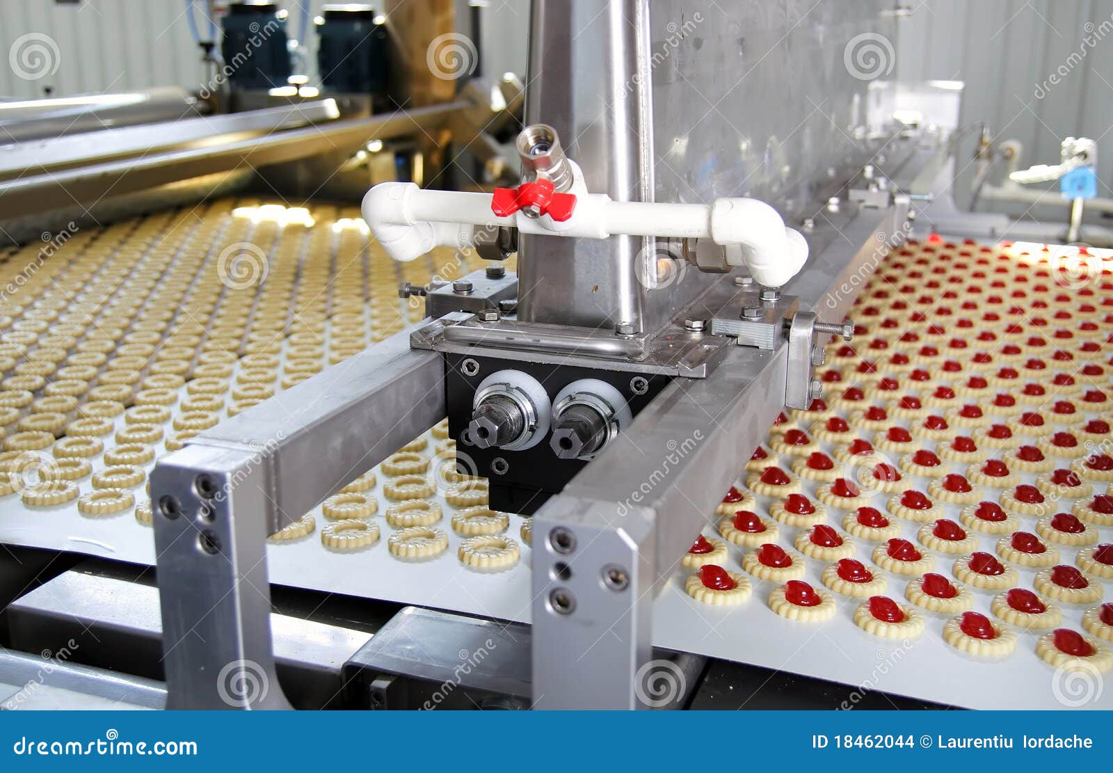 cookie making machine in the factory Stock Photo by Lobachad