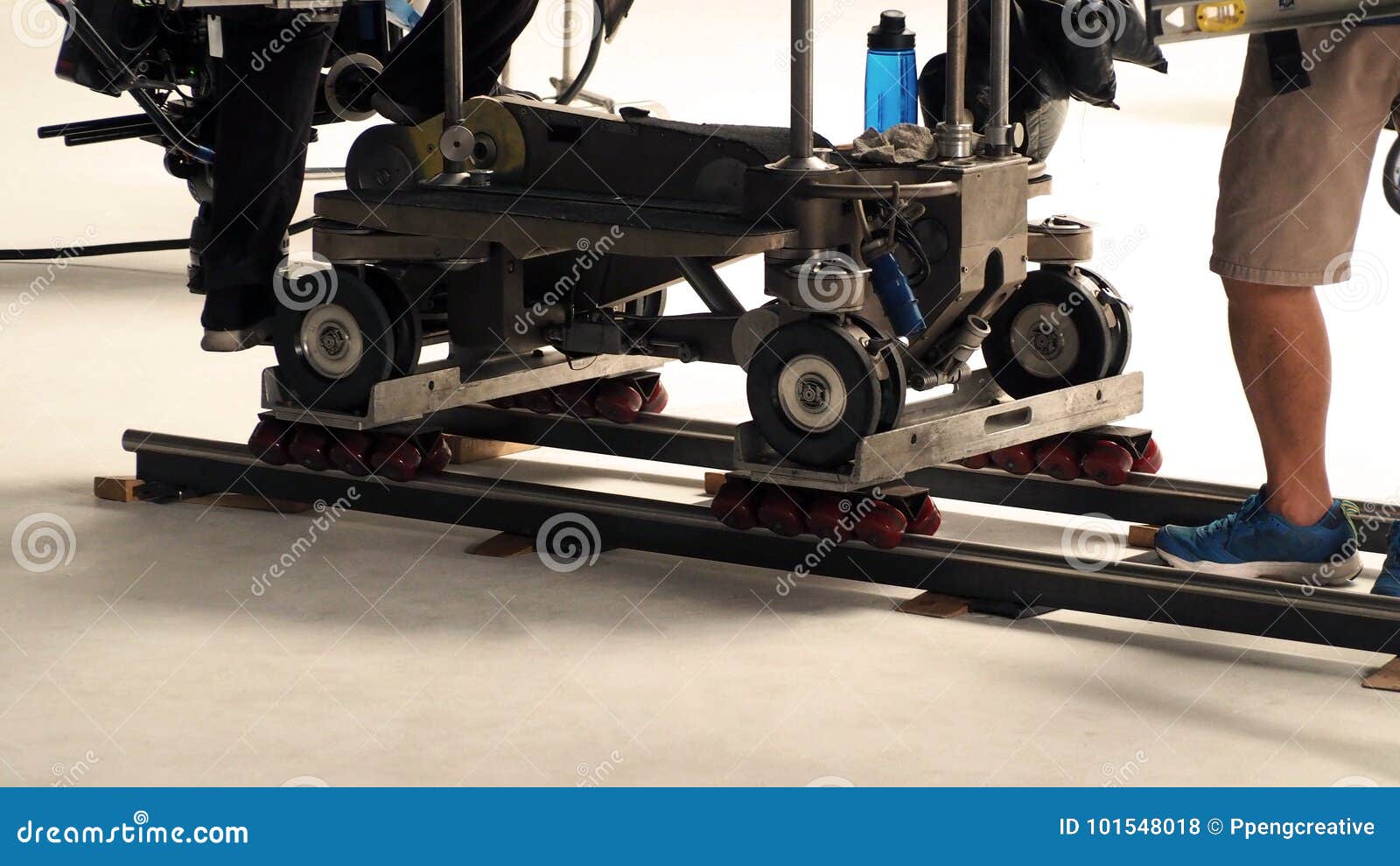 Production Crew Setting Dolly Track in Studio. Stock Photo Image of