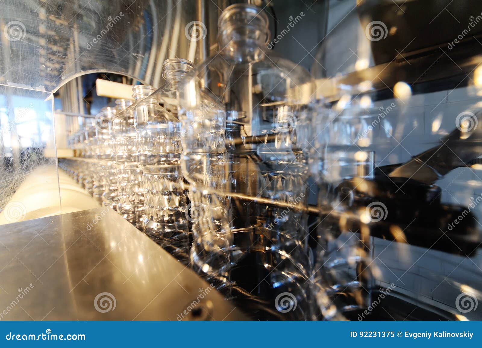 Production of PET Bottles. Many Plastic Bottles Close-up Stock Image ...