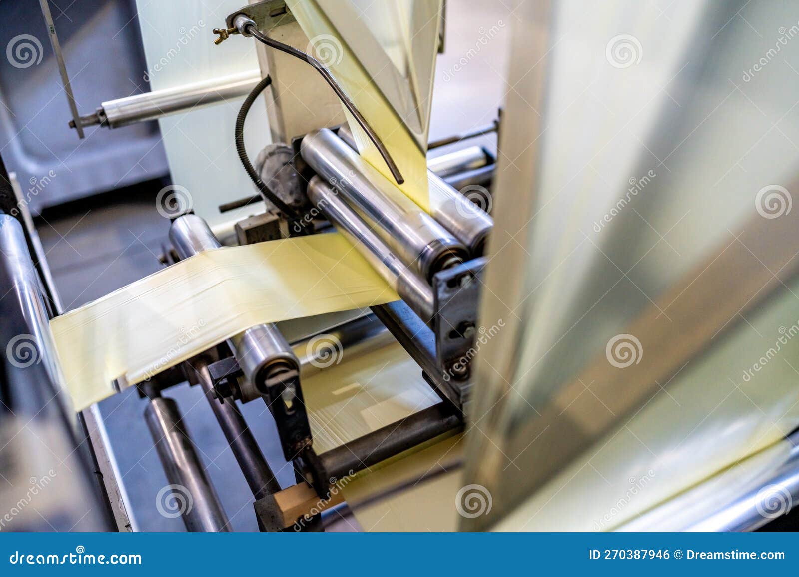 Production of Plastic Packaging Materials in the Factory Stock Photo