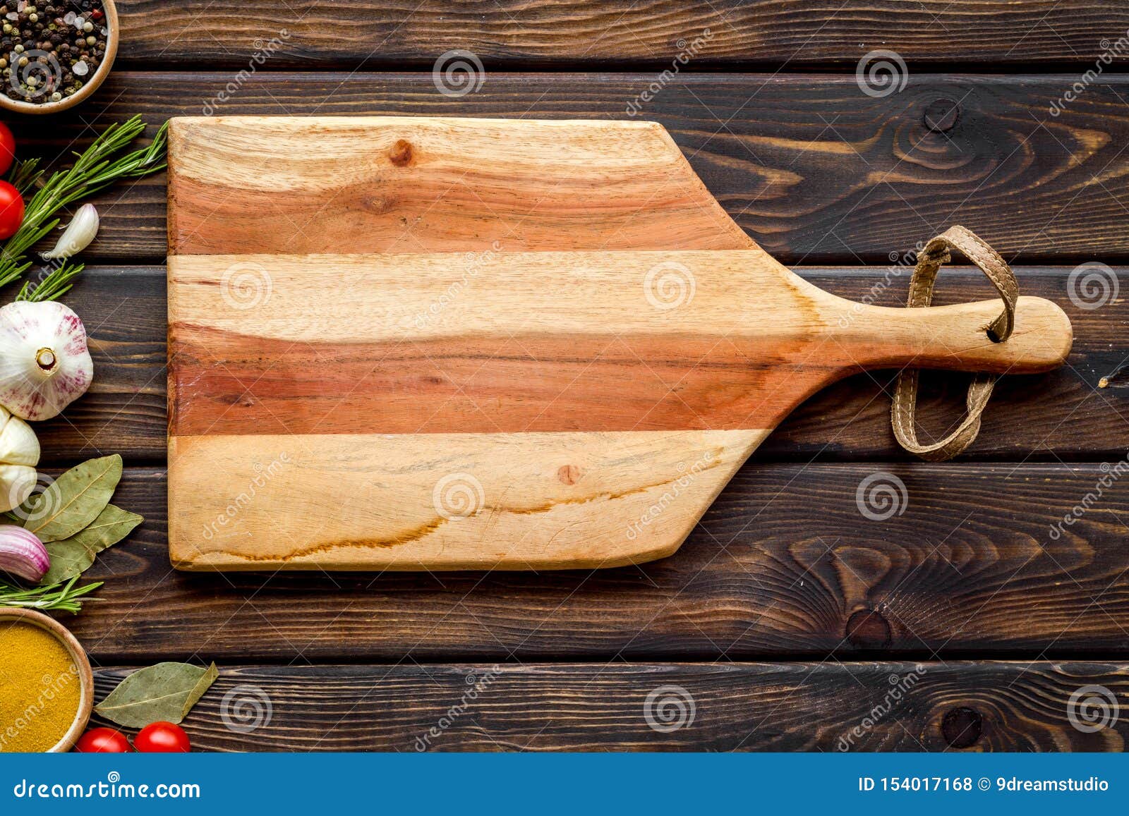 Download Products Frame And Cutting Board On Wooden Background Top ...