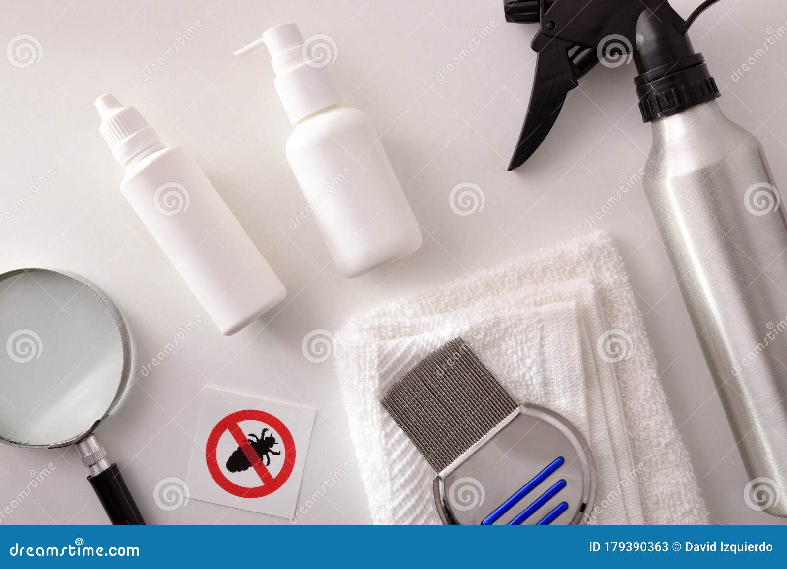 Products and Professional Equipment for Treating Lice on White Table