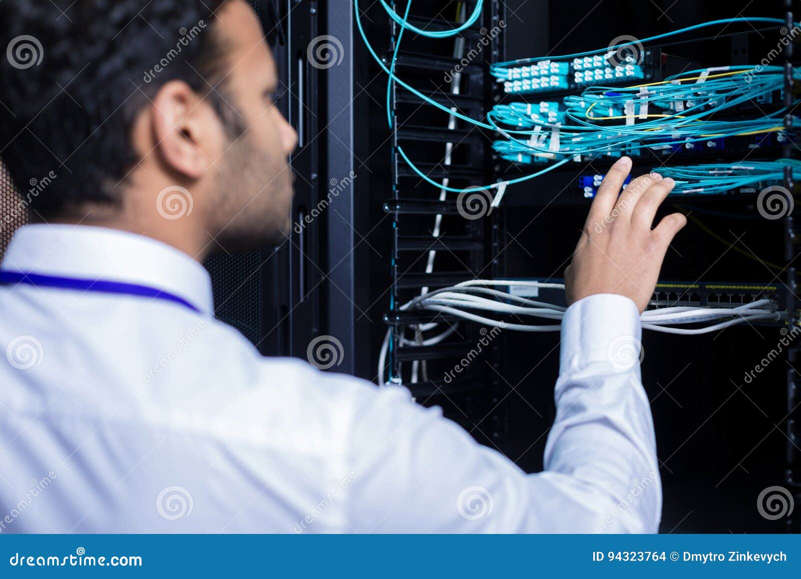 Professional it Administrator Checking Cables Stock Photo
