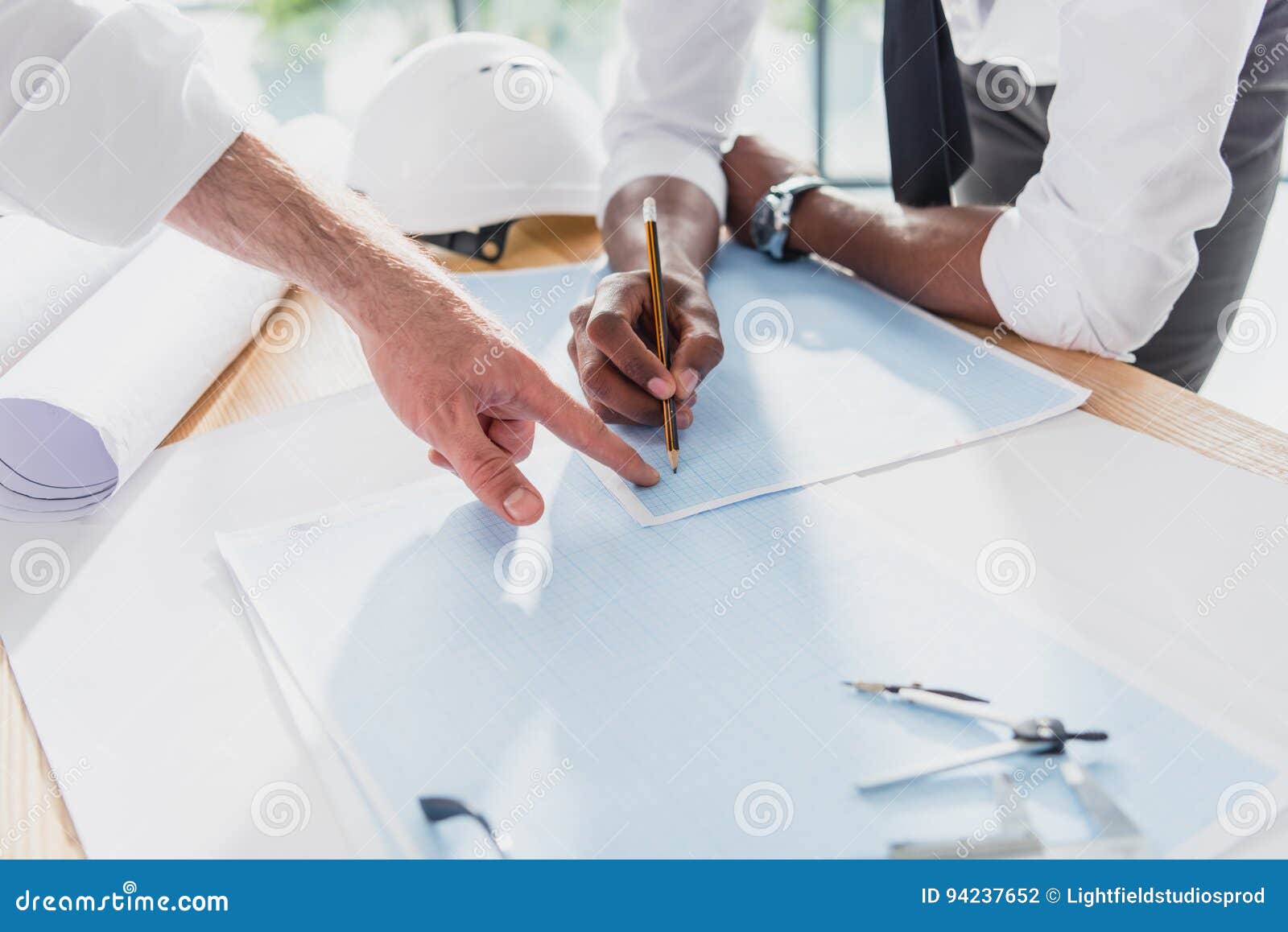 Professional Architects in Formal Wear Working at Modern Office Stock