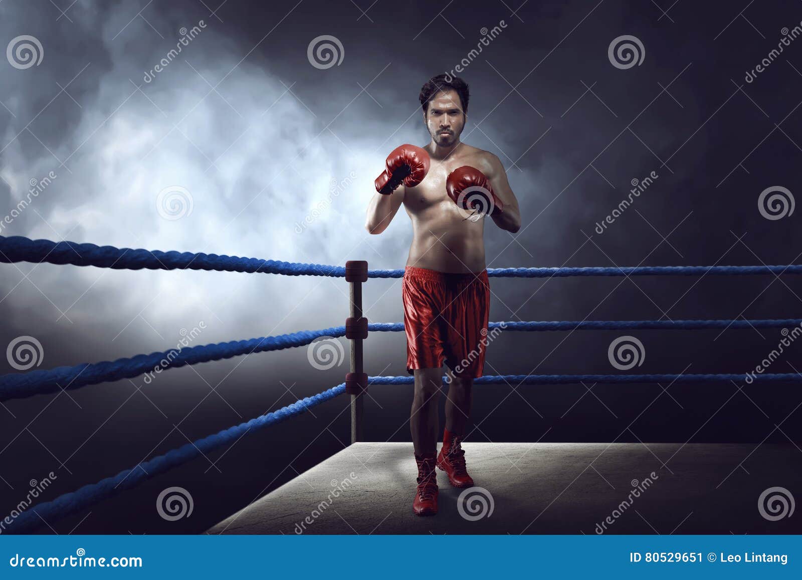 Professional Asian Boxer Guy with Glove Was Practicing Stock Image