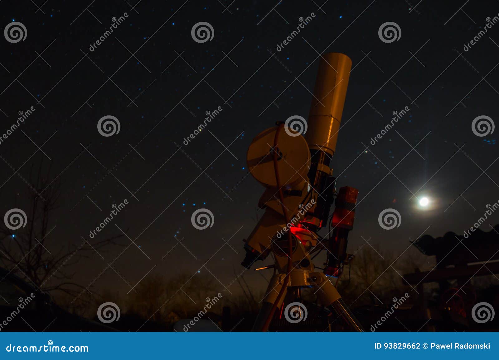 professional astrophotography equipment working under the dark sky