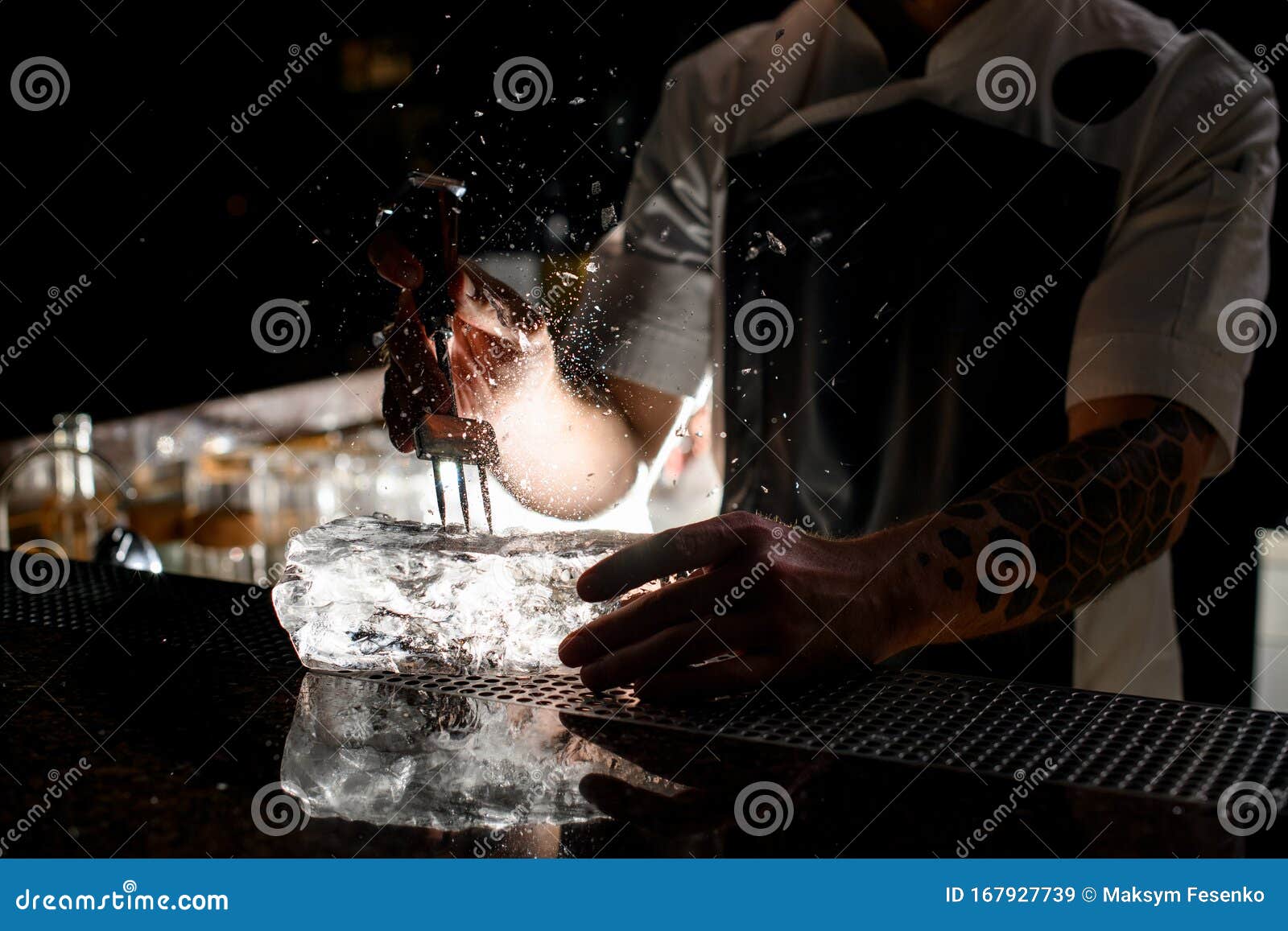 Professional Bartender Staking a Large Chunk of Ice with a Special Tool Stock Image Image of