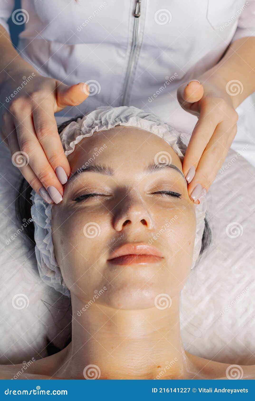 Professional Beautician Makes A Facial Massage To A Woman Stock Image Image Of Facial Girl