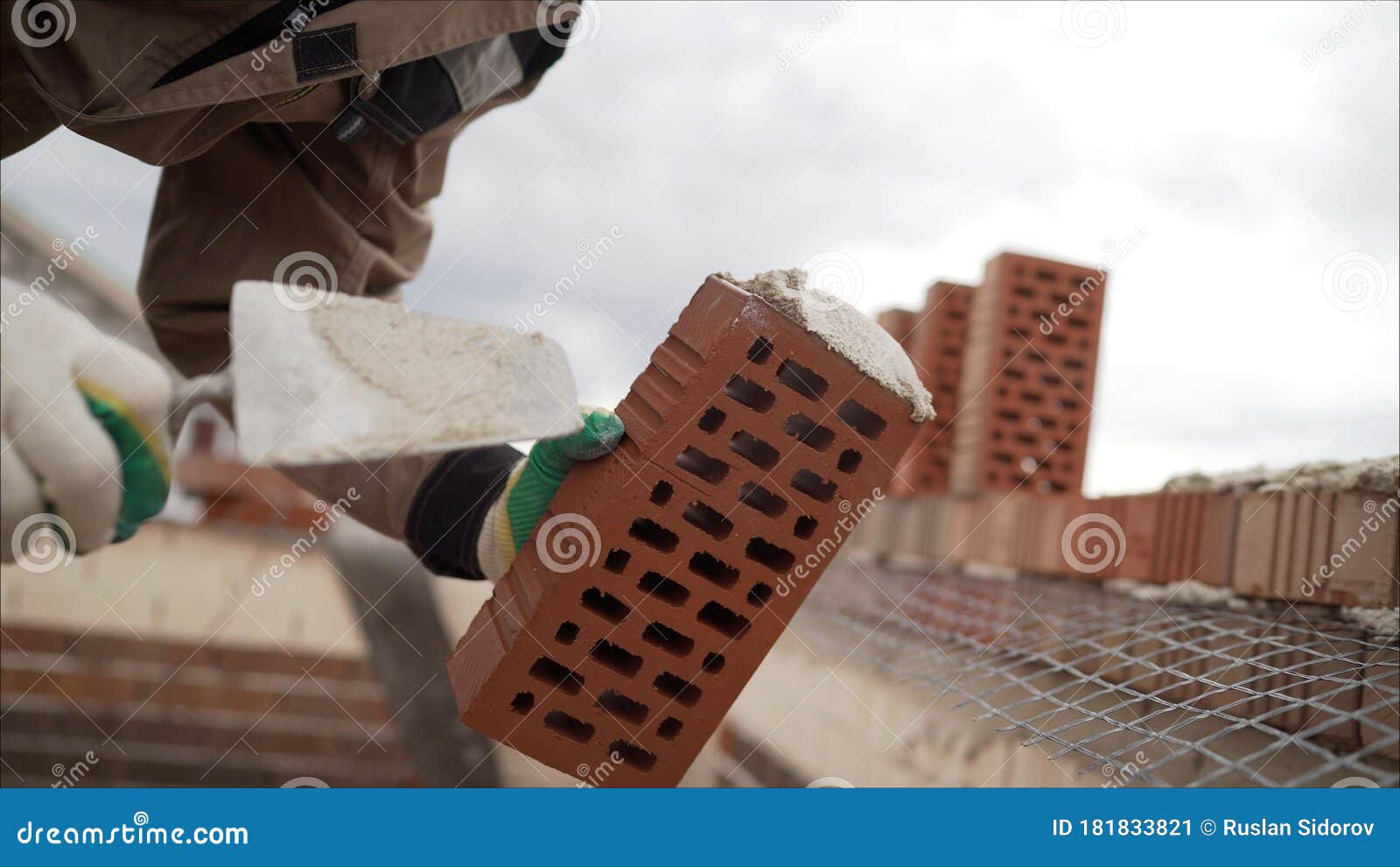 Professional Bricklaying during the Construction of a House. the