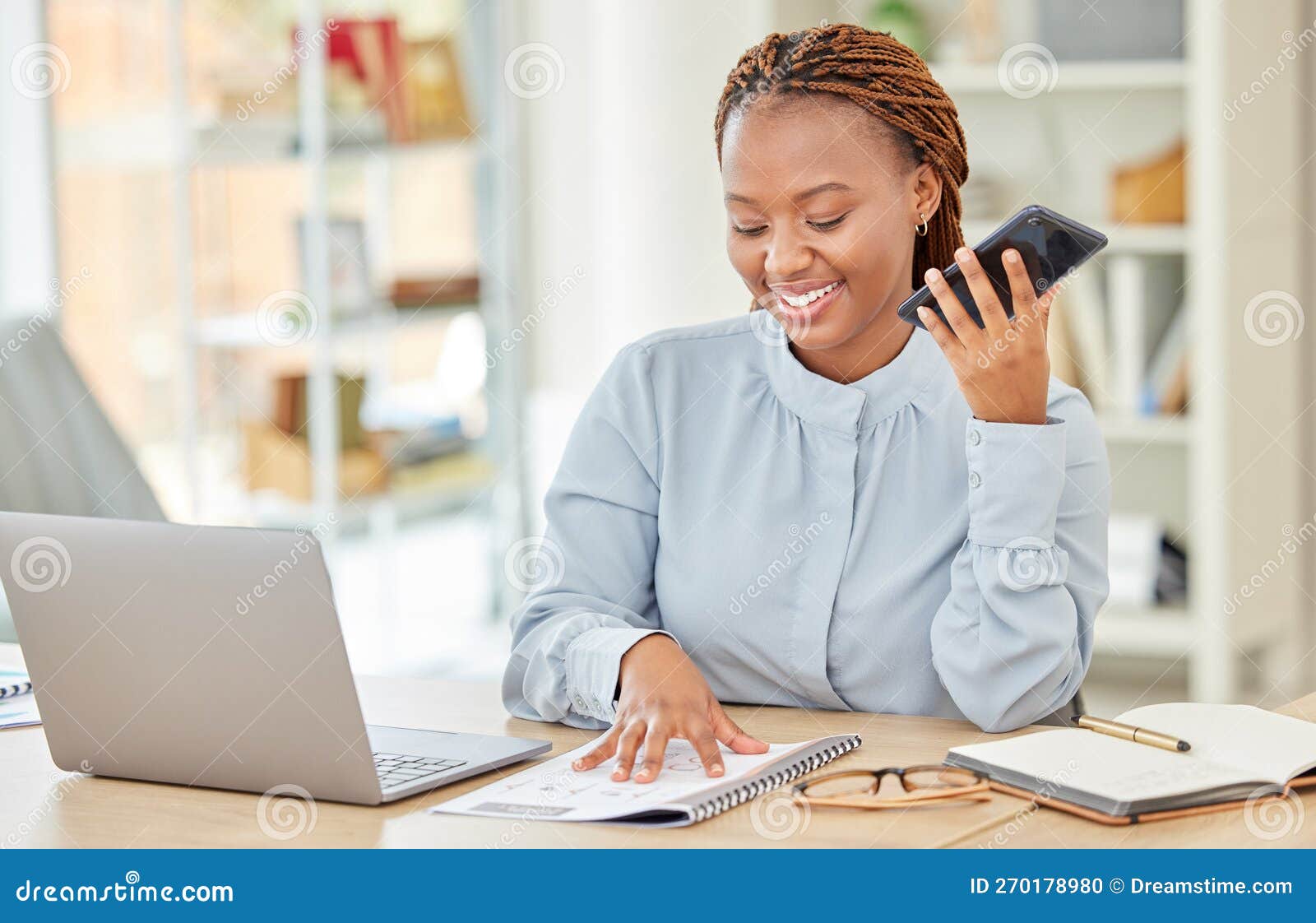 Professional Business Woman with Phone Call Reading Notebook on Her