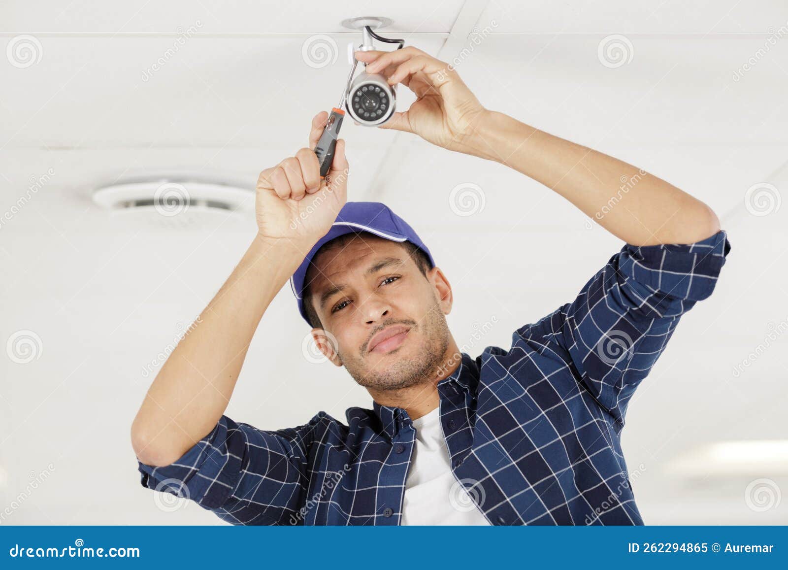 Professional Cctv Technician Working Installing Camera Stock Image