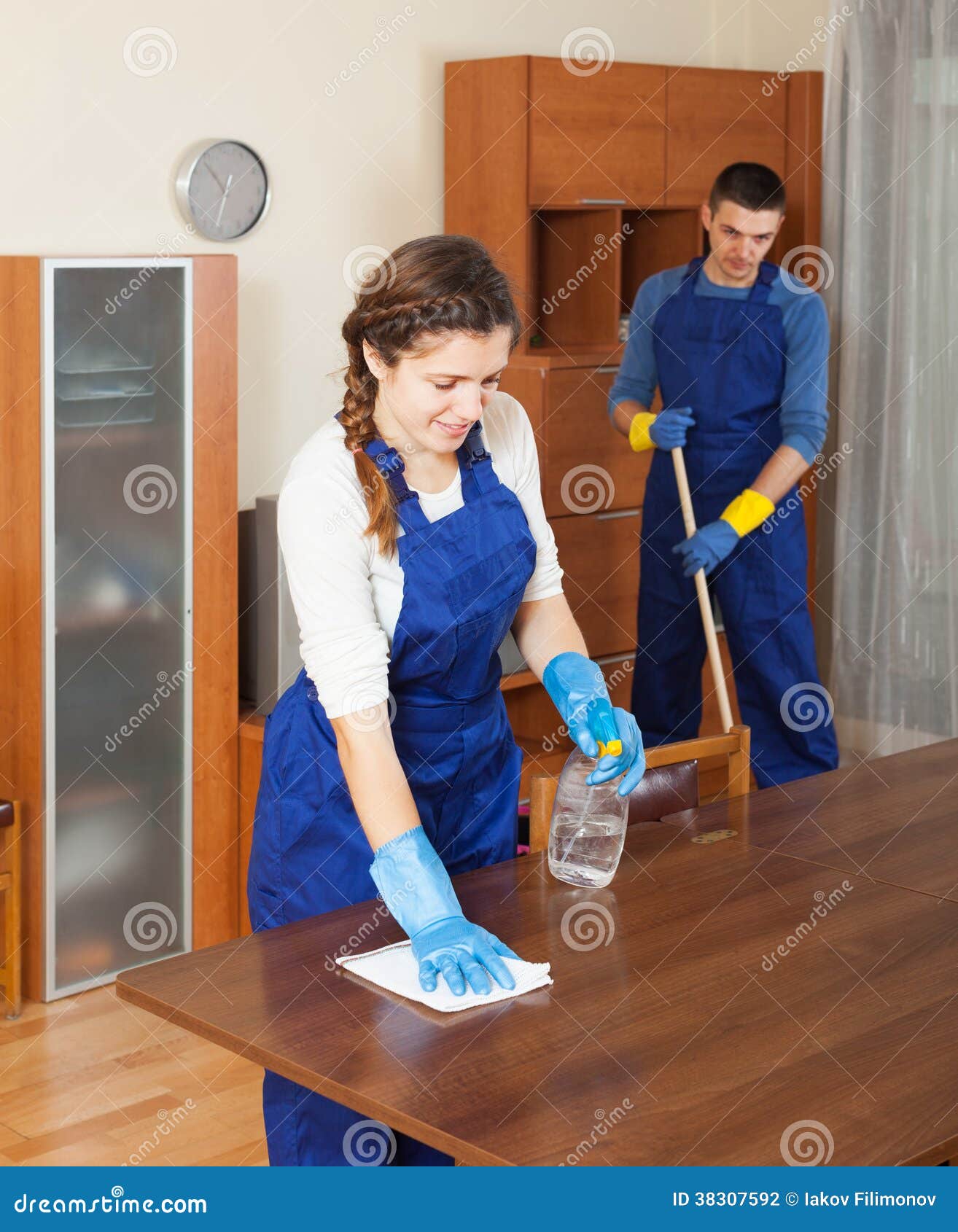 professional cleaners cleaning furniture stock photo professional house cleaner
