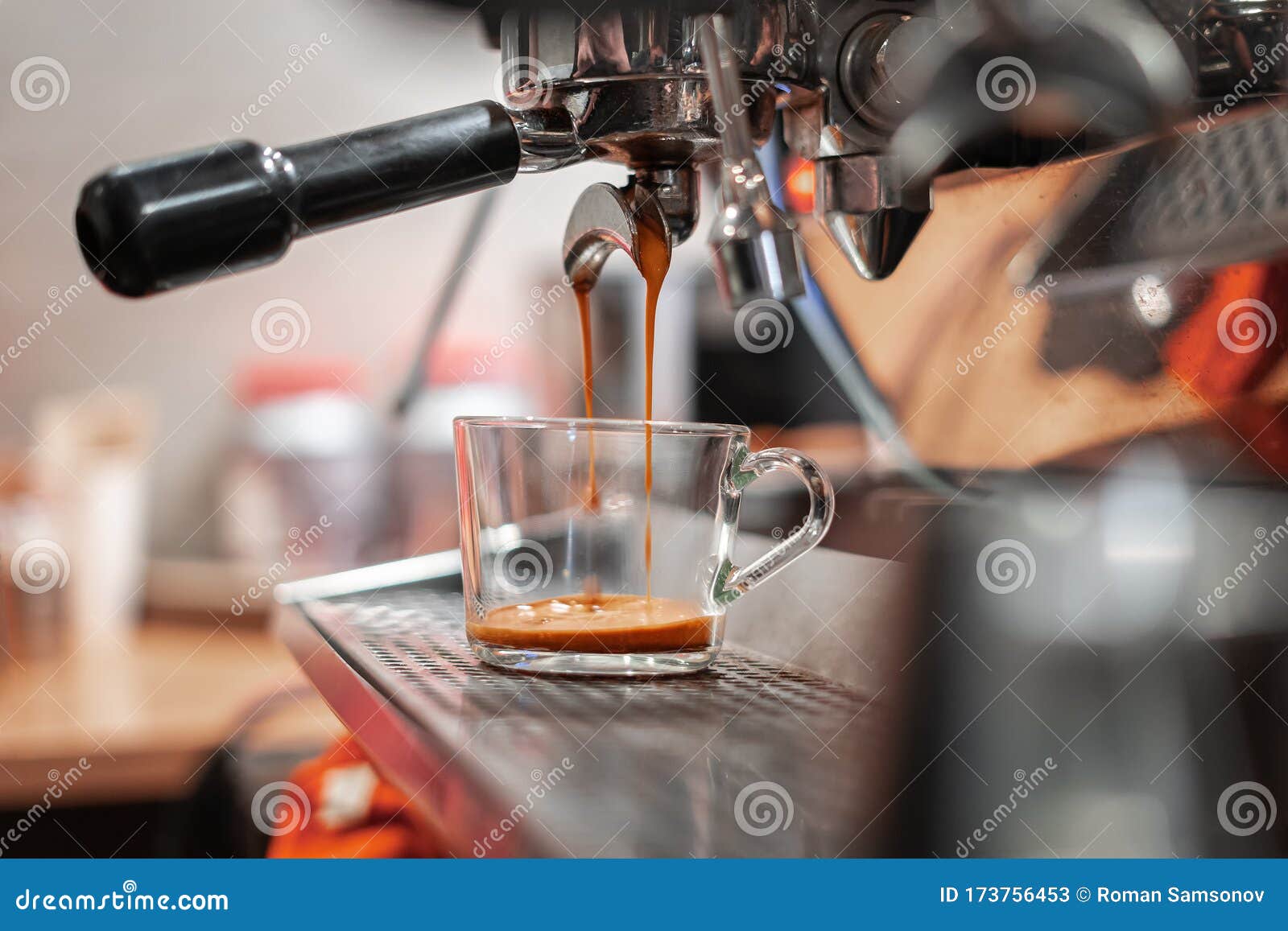 A Professional Coffee Machine Brews Coffee in a Glass Cup Stock Image