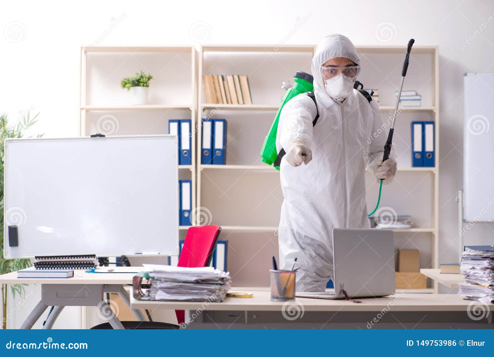 Professional Contractor Doing Pest Control At Office Stock Photo - Image of pointing ...