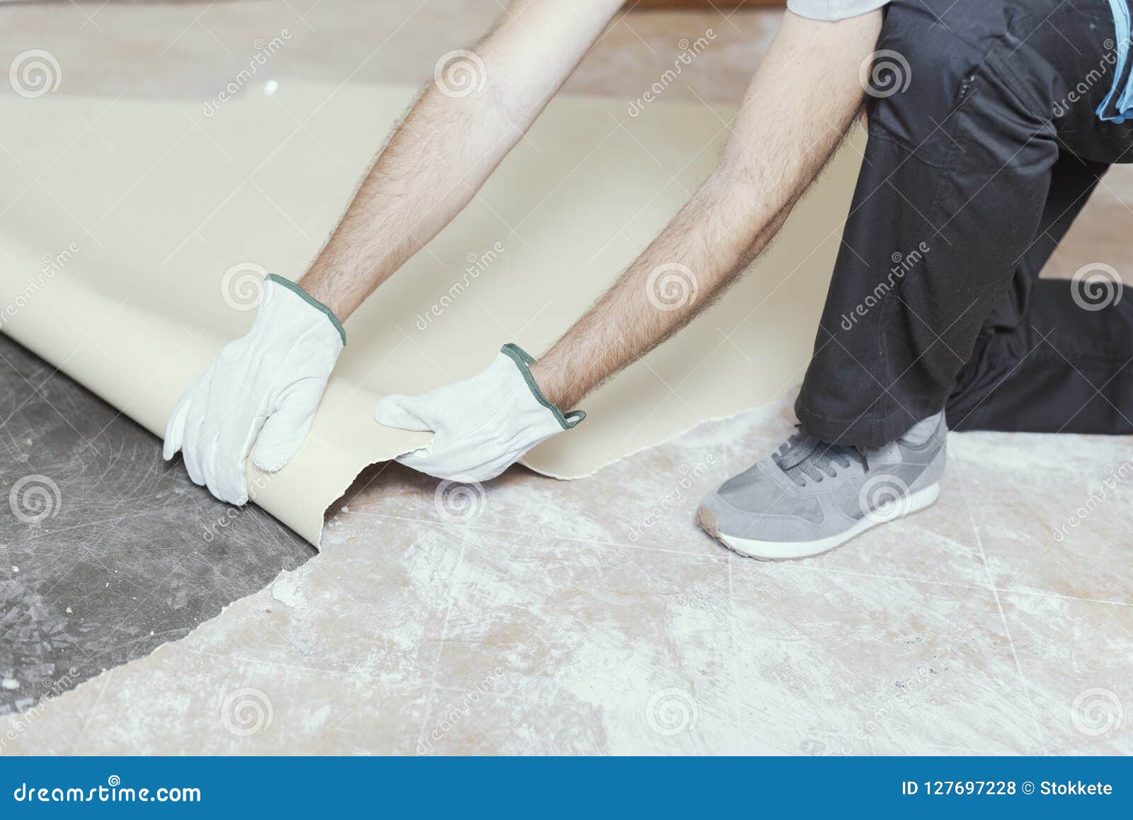 Contractor Removing An Old Linoleum Flooring Stock Photo Image