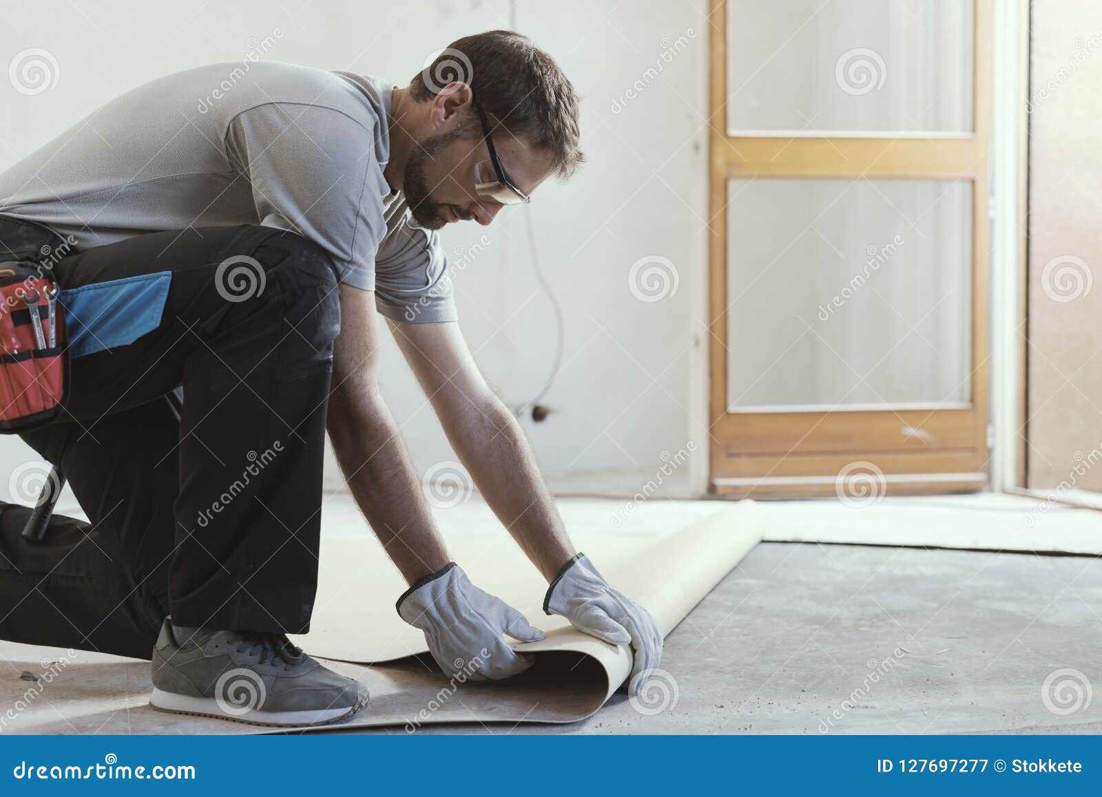 Contractor Removing An Old Linoleum Flooring Stock Image Image