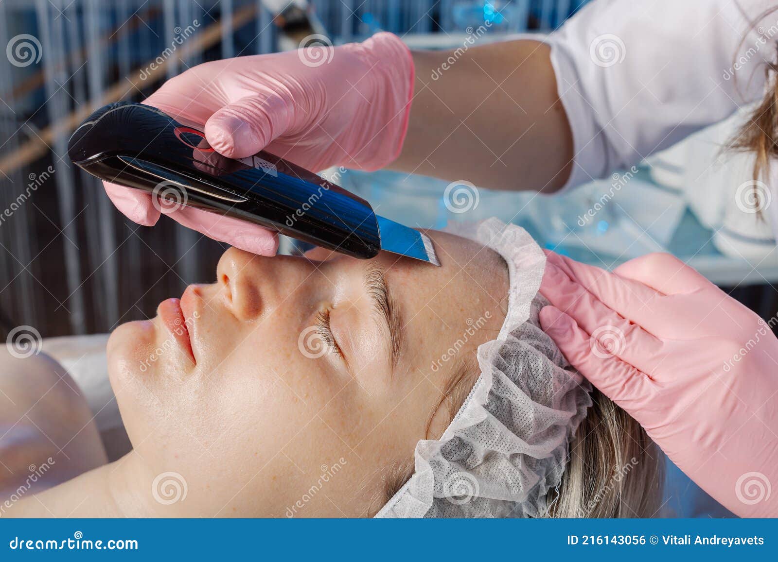 A Professional Cosmetologist Performs An Ultrasonic Face Cleaning