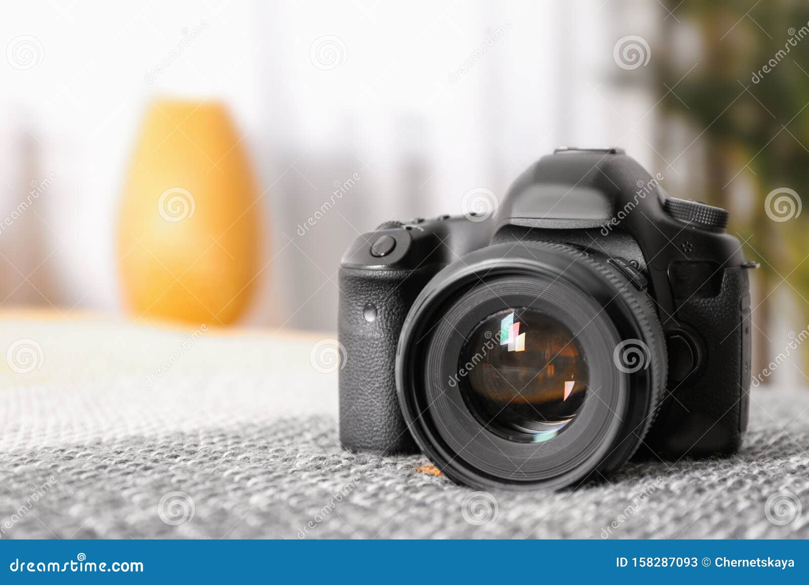 Professional Digital Camera Against Blurred Background Stock Image ...