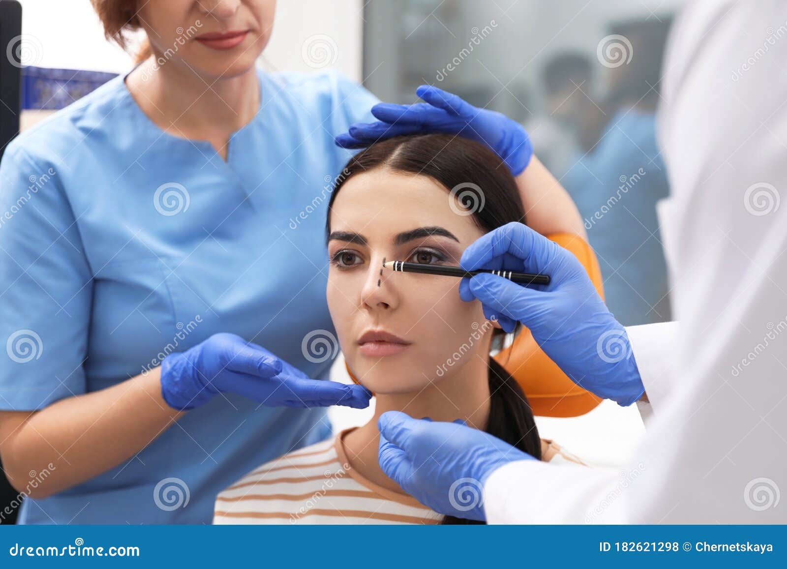 Doctors Examining Patient before Surgery in Clinic Stock Photo Image of examining, adult