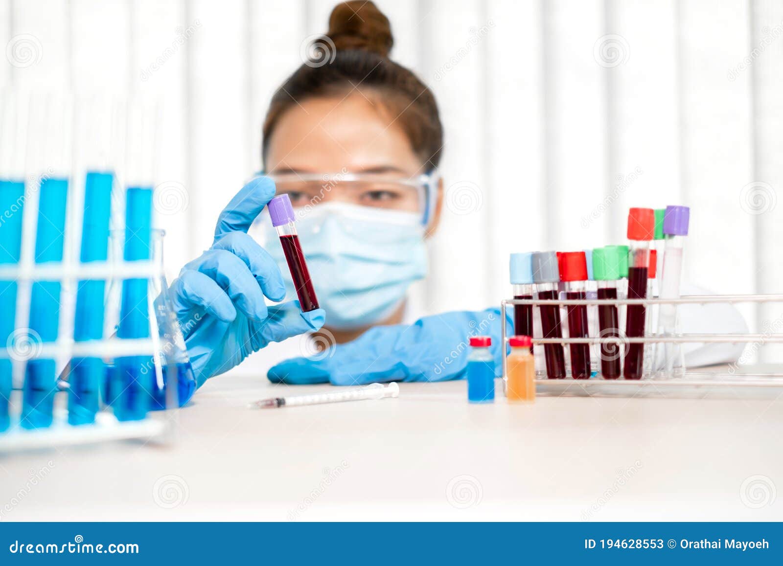 Professional Doctors Perform Find Virus Tests from Samples of Blood