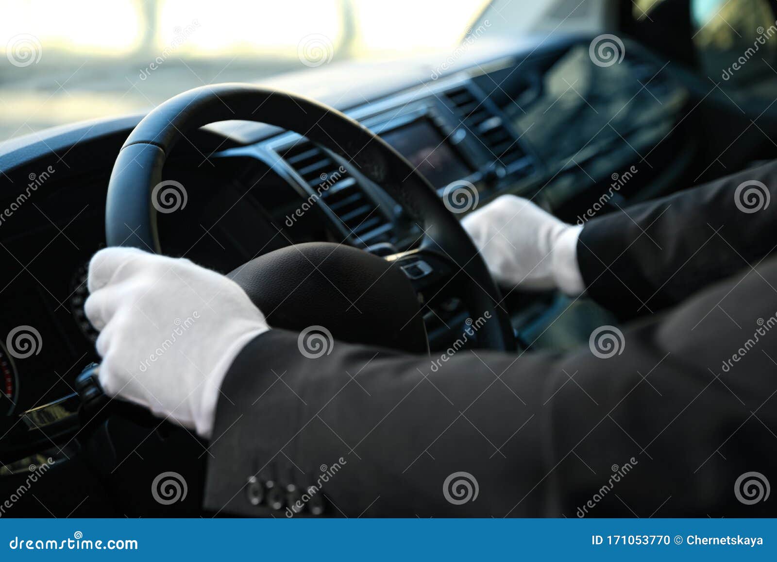Professional Driver in Luxury Car. Chauffeur Service Stock Photo