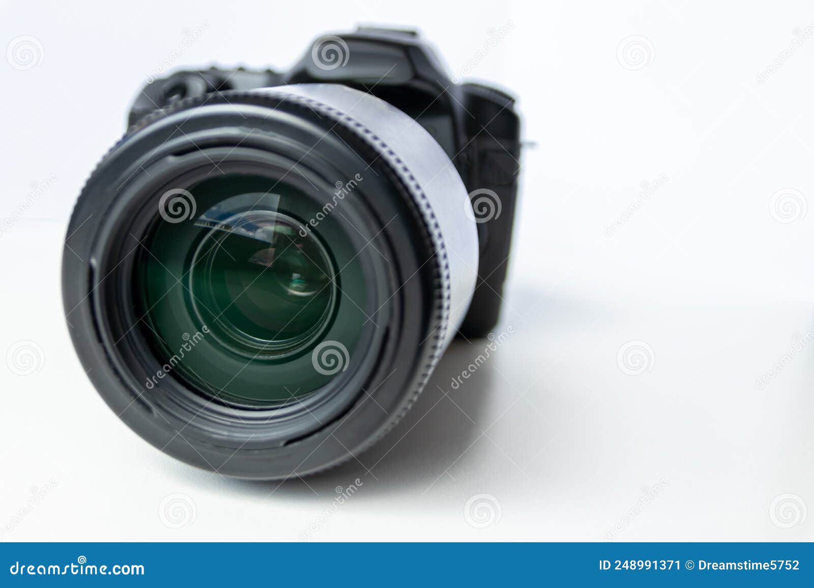 professional dslr camera equipment with 70-300 mm tele zoom objective with wide camera lens in macro close-up view shows details