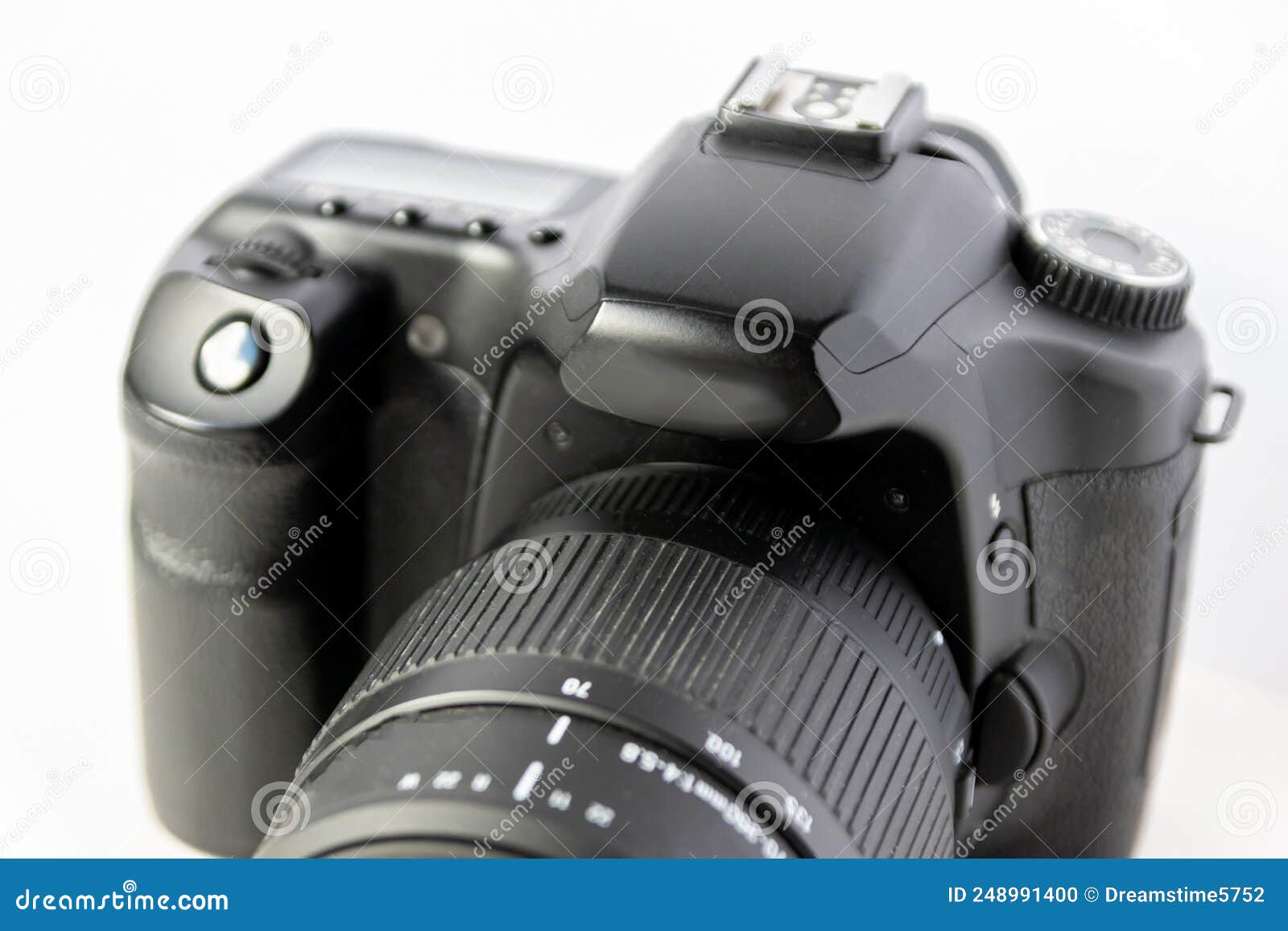 professional dslr camera equipment with 70-300 mm tele zoom objective with wide camera lens in macro close-up view shows details