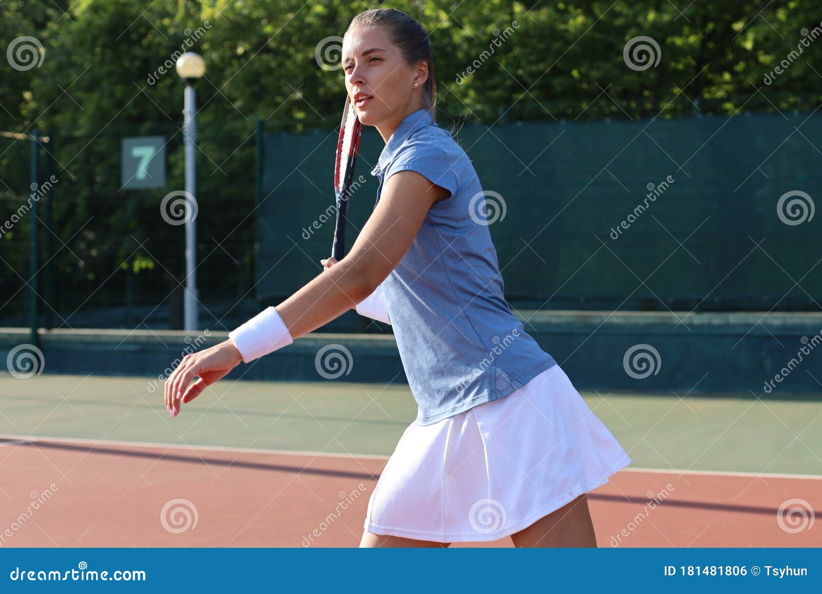 Professional Equipped Female Tennis Player Beating Hard The Tennis Ball With Racquet Its Good