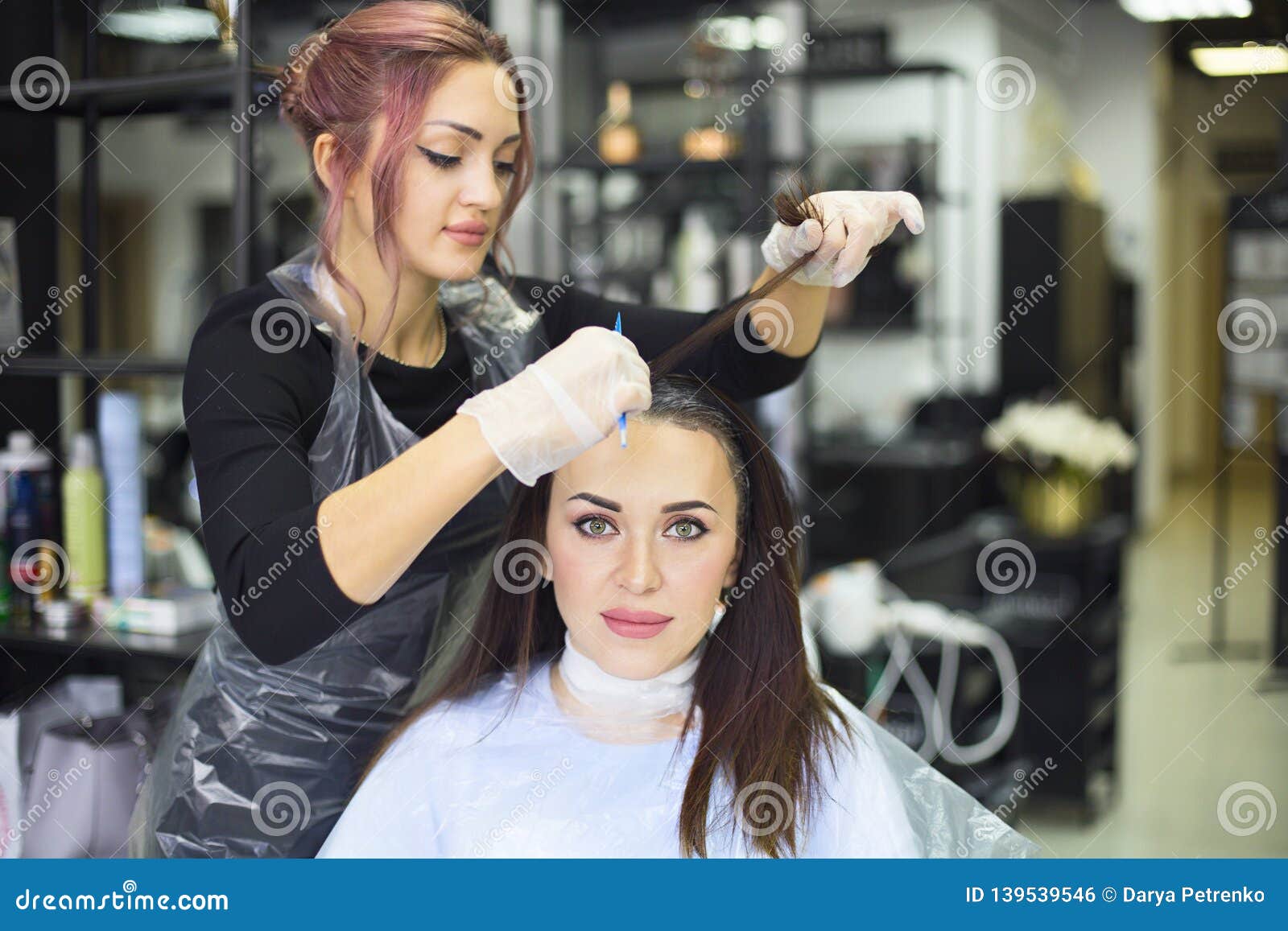 Professional Female Hairdresser Applying Color To Female Customer at Design Hair  Salon, Woman Having Her Hair Dyed Stock Photo - Image of profession,  beautiful: 139539546
