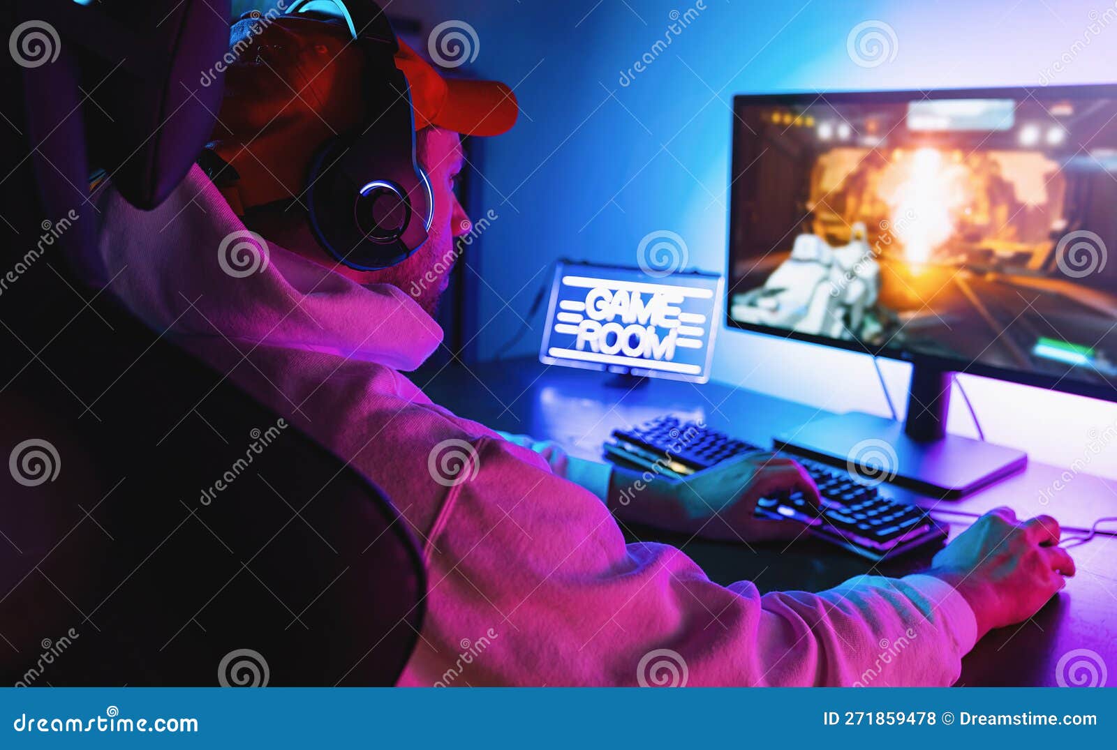 Professional Gamer Playing First-Person Shooter Online Video Game on His Powerful Personal Computer