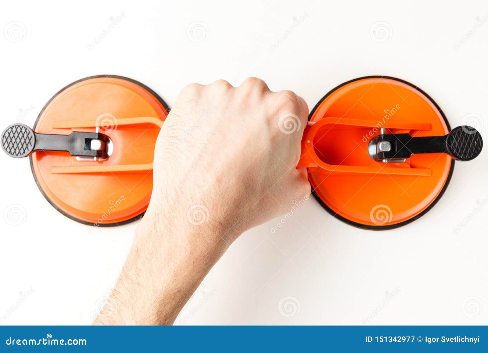 Professional is Installing the Glass with a Suction Cup for